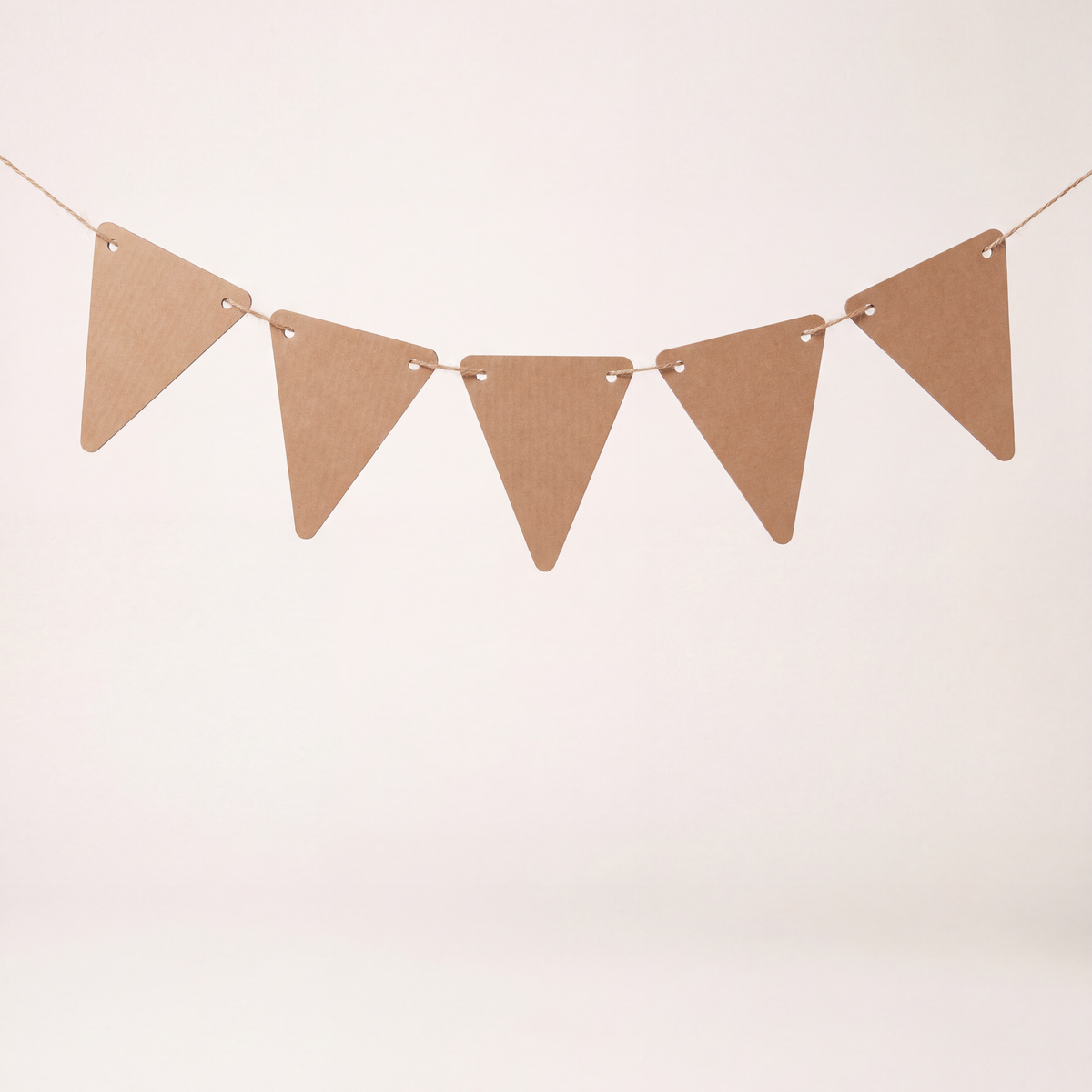 Paintable bunting flags hanging on a DUDUK playhouse