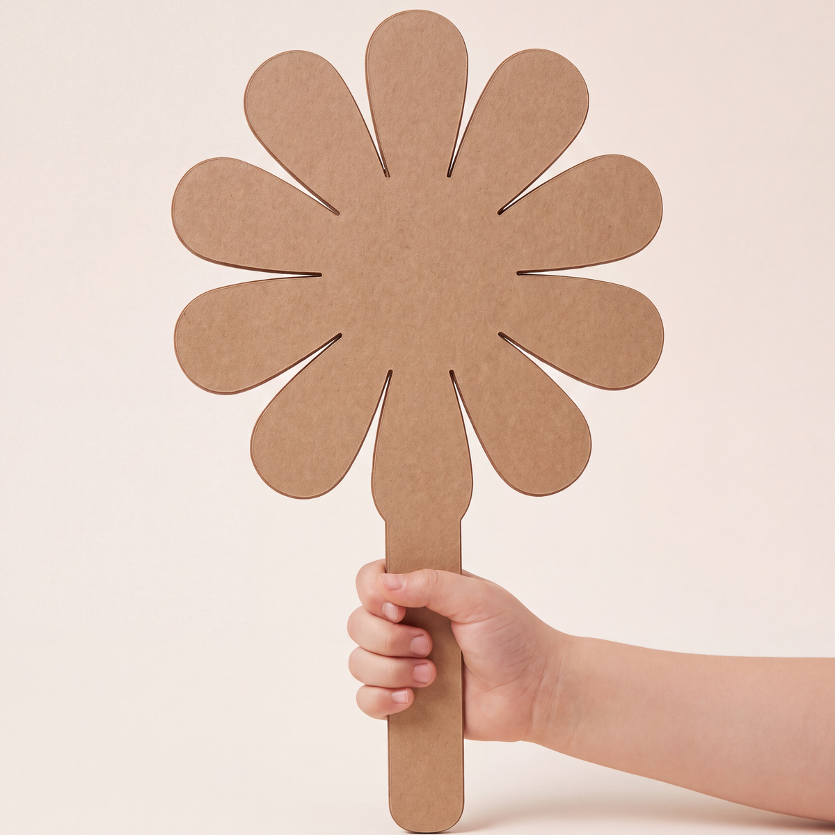 Child holding a DUDUK Flower Kit daisy