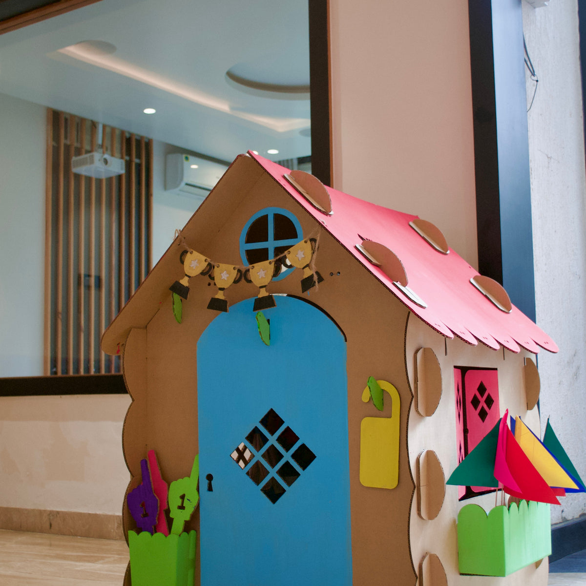 Football-themed DUDUK Cubby House, painted and decorated