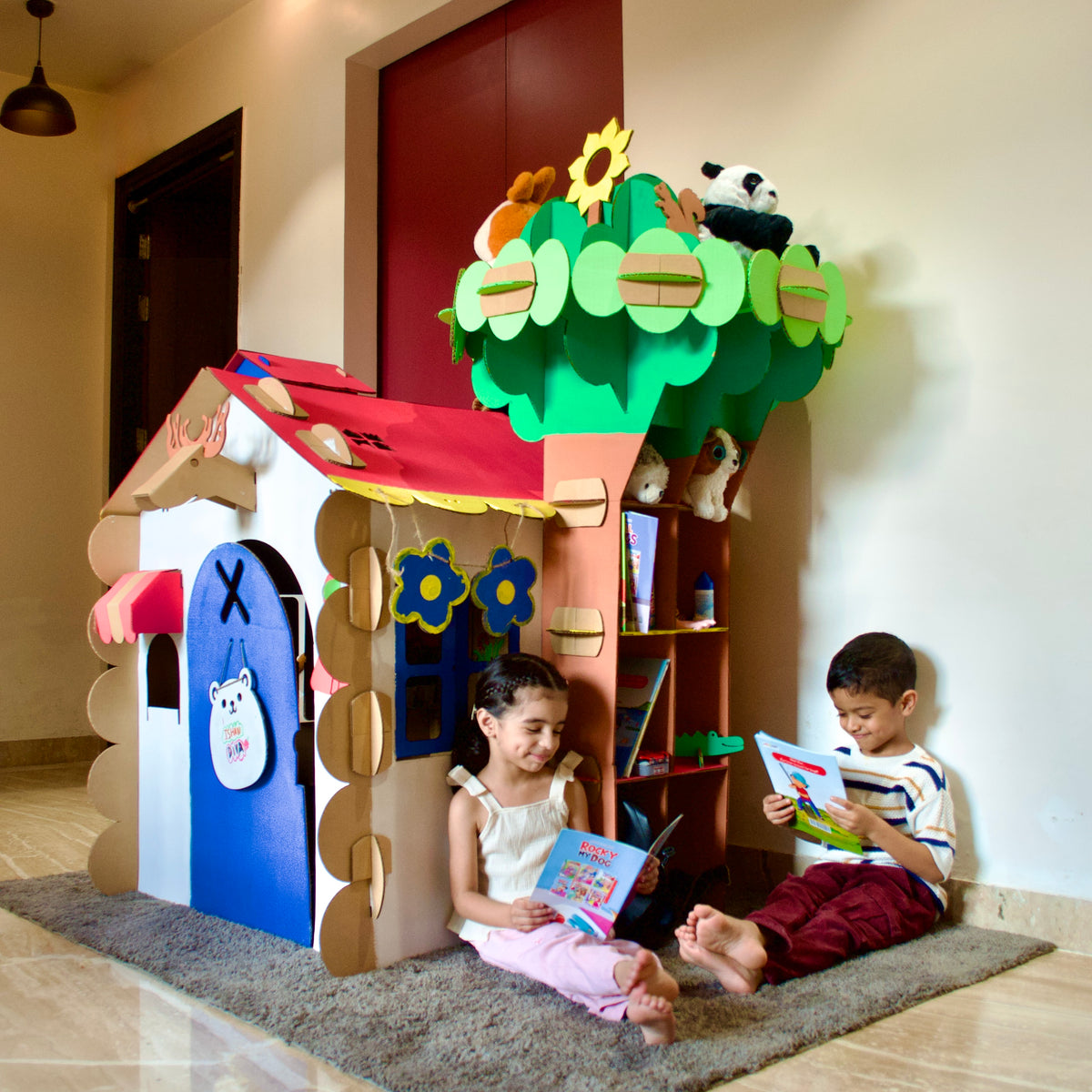 Children reading books inside a DUDUK tree house playhouse